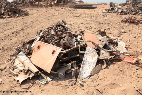 141027 5896
Wedgefield, Sell and Parker's metal recycling yard, a pile of bits from GE AC6000 unit 6071.
