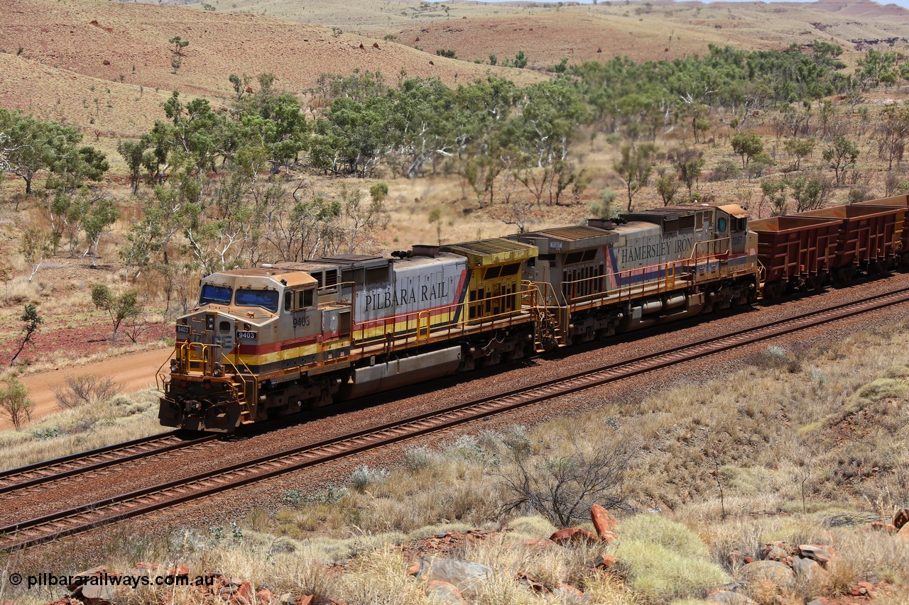151111 9579
An empty train is still struggling upgrade at the 98 km post on the Tom Price line behind double General Electric Dash 9-44CW units 9403 serial 53457 wearing ROBE Pilbara Rail livery and 7087 serial 47766 wearing the original Hamersley Iron livery.
Keywords: 9403;GE;Dash-9-44CW;53457;