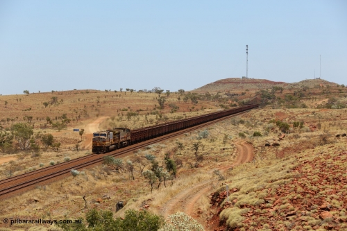 151111 9574
An empty train is still struggling upgrade at the 98 km post on the Tom Price line behind double General Electric Dash 9-44CW units 9403 serial 53457 wearing ROBE Pilbara Rail livery and 7087 serial 47766 wearing the original Hamersley Iron livery.
Keywords: 9403;GE;Dash-9-44CW;53457;
