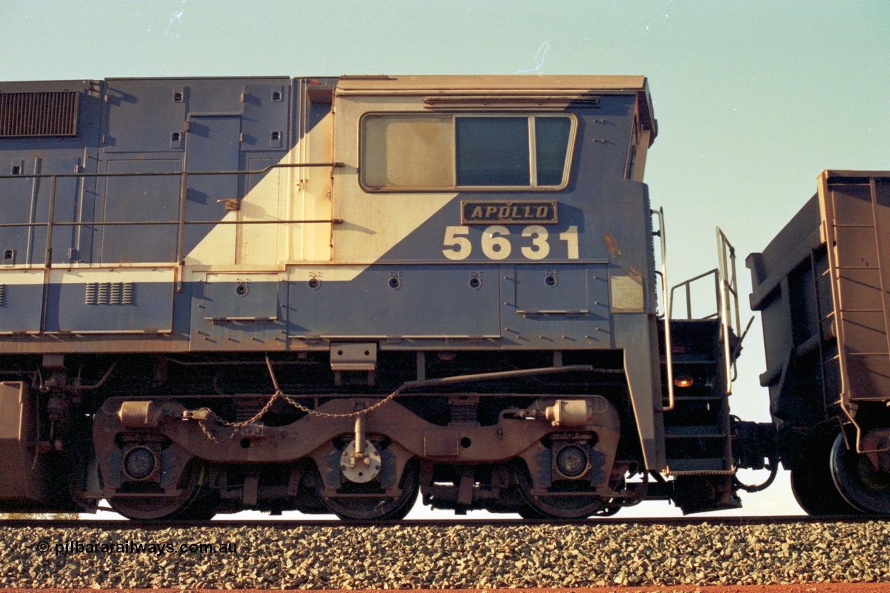 196-06
Yandi Two, BHP Iron Ore 5631 'Apollo' serial 5831-10 / 88-080 originally built new by Goninan as a GE CM39-8 in 1988. Drivers side cab view shows hand brake chain and bogie. May 1998.
Keywords: 5631;Goninan;GE;CM39-8;5831-10/88-080;