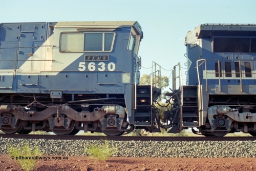 196-08
Yandi Two, BHP Iron Ore 5630 'Zeus' serial 5831-09 / 88-079 originally built new by Goninan as a GE CM39-8 in 1988. Drivers side cab view shows hand brake chain and bogie. May 1998.
Keywords: 5630;Goninan;GE;CM39-8;5831-09/88-079;