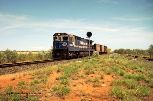 197-06
Goldsworthy Junction, looking west with the end of the triangle or wye, signal post is GJ 7, empty iron ore train behind BHP's Goninan 1988 build GE CM39-8 unit 5632 'Poseidon' serial 5831-11 / 88-081.
Keywords: 5632;Goninan;GE;CM39-8;5831-11/88-081;