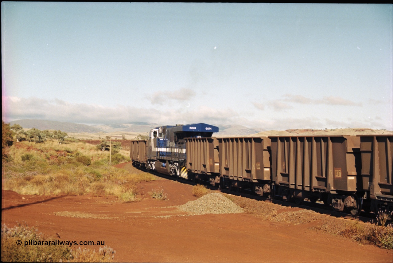 207-04
BHP General Electric built AC6000 unit 6074 serial 51066, brand new and unnamed at Yandi One load-out loop as a remote mid-train unit.
Keywords: 6074;GE;AC6000;51066;