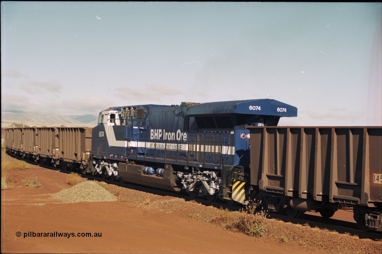 207-07
BHP General Electric built AC6000 unit 6074 serial 51066, brand new and unnamed at Yandi One load-out loop as a remote mid-train unit.
Keywords: 6074;GE;AC6000;51066;
