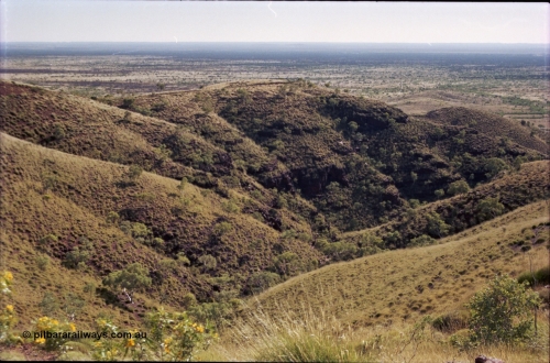 207-02
Koodaideri, view from saddleback looking north across the Fortescue Valley, Wittenoom - Roy Hill Rd can be seen if you know what to look for.

