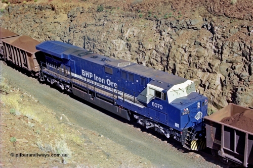 207-18
BHP General Electric built AC6000 unit 6071 serial 51063 brand new and unnamed on the loaded side of Yandi One load-out loop as a remote mid-train unit, showing roof view and the original style windscreen protectors.
Keywords: 6071;GE;AC6000CW;51063;