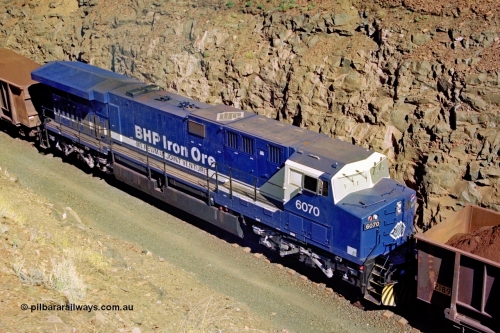 207-19
BHP General Electric built AC6000 unit 6071 serial 51063 brand new and unnamed on the loaded side of Yandi One load-out loop as a remote mid-train unit, showing roof view and the original style windscreen protectors.
Keywords: 6071;GE;AC6000CW;51063;