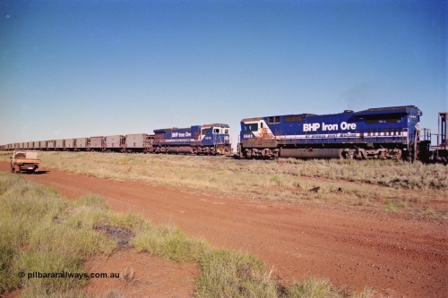 207-28
Hardie Siding, the days of the C36-7M or Dash 7 units running the Goldsworthy line are almost over, as the CM40-8M or Dash 8 variants take up the task following the arrival of the AC6000 class units. Here, CM40-8MEFI unit 5669 'Beilun' takes the passing track with an empty as C36-7M unit 5513 holds the mainline with a loaded.
Keywords: 5669;Goninan;GE;CM40-8EFI;8412-02/95-160;rebuild;Comeng-NSW;ALCo;M636C;5486;C6084-2;