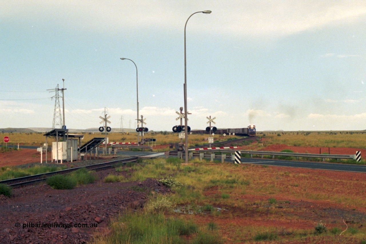 218-20
De Grey, Great Northern Highway grade crossing at the 57.15 km with a loaded train on approach.
Keywords: 5510;Goninan;GE;C36-7M;4839-07/87-075;rebuild;AE-Goodwin;ALCO;C636;5458;G6027-2;