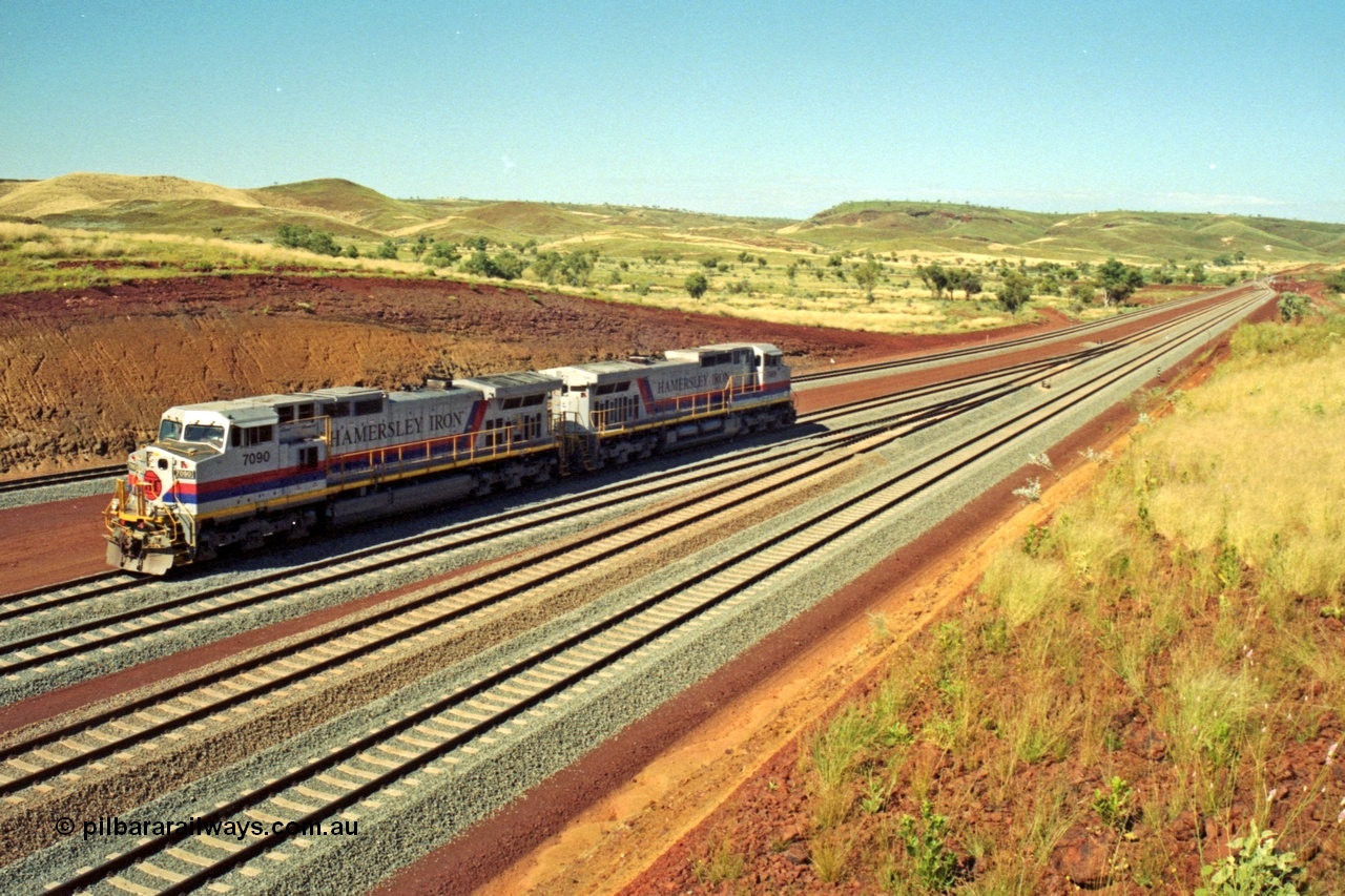 218-26
Yandicoogina or HIY as Hamersley Iron identify it, located 445 km from Parker Point yard in Dampier. Bank engine units General Electric Dash 9-44CW models 7090 serial 47769 and 7089 idle away waiting their next loaded train to push out.
Keywords: 7090;GE;Dash-9-44CW;47769;