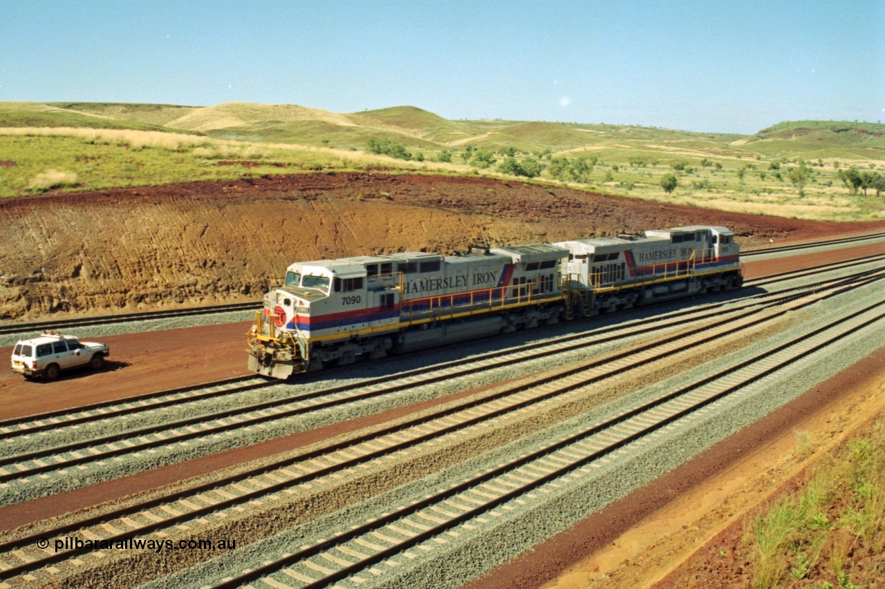 218-28
Yandicoogina or HIY as Hamersley Iron identify it, located 445 km from Parker Point yard in Dampier. Bank engine units General Electric Dash 9-44CW models 7090 serial 47769 and 7089 idle away waiting their next loaded train to push out.
Keywords: 7090;GE;Dash-9-44CW;47769;