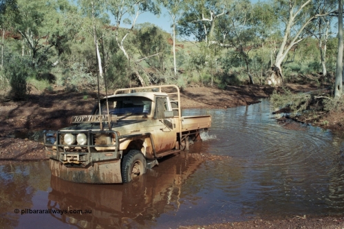 218-01
Yandi, river access road that runs between Roy Hill Rd and Yandi Junction, sort of following the train line, Toyota Land Cruiser Toy Titan, 1994 HJ75 series tray back.
