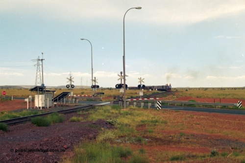 218-20
De Grey, Great Northern Highway grade crossing at the 57.15 km with a loaded train on approach.
Keywords: 5510;Goninan;GE;C36-7M;4839-07/87-075;rebuild;AE-Goodwin;ALCO;C636;5458;G6027-2;
