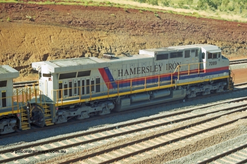 218-32
Yandicoogina or HIY as Hamersley Iron identify it, located 445 km from Parker Point yard in Dampier. Bank engine unit General Electric Dash 9-44CW model 7089 serial 47768 idles away waiting the next loaded train to push out.
Keywords: 7089;GE;Dash-9-44CW;47768;