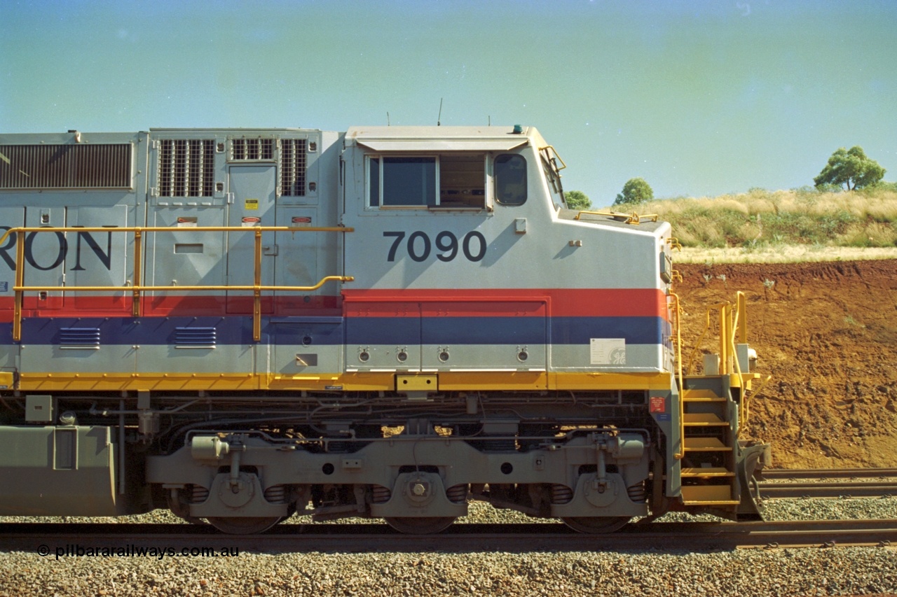 219-07
Yandicoogina or HIY as Hamersley Iron identify it, located 445 km from Parker Point yard in Dampier. Bank engine unit General Electric Dash 9-44CW model 7090 serial 47769 in the delivered 'Pepsi Can' livery. Drivers side cab view.
Keywords: 7090;GE;Dash-9-44CW;47769;