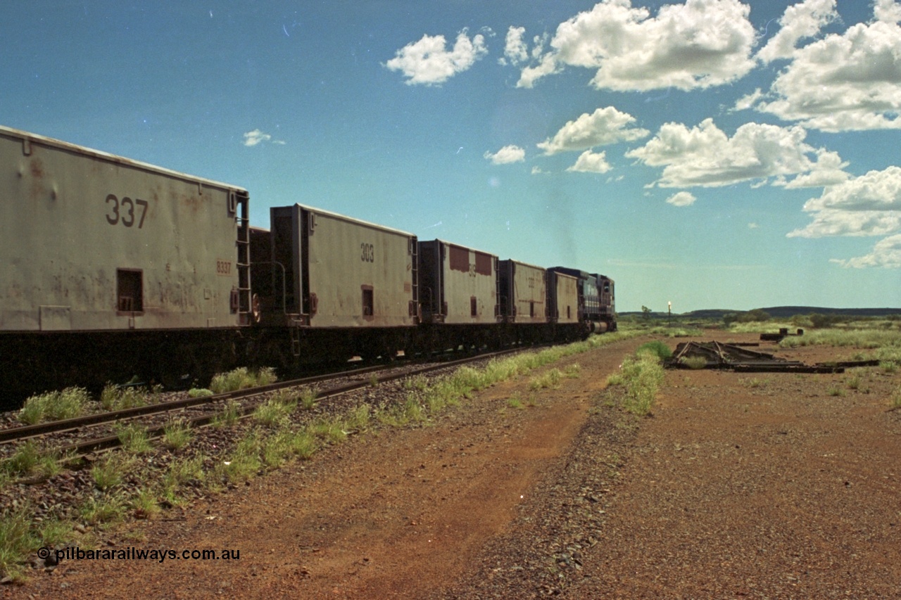 219-35
Goldsworthy Siding, a loaded train powers along the mainline behind BHP C36-7M unit 5513 'Kalgan' serial 4839-02 / 88-078, with some Gunderson USA built smooth sided waggons ex-Phelps Dodge Copper Mine.
Keywords: 303;Gunderson-USA;BHP-ore-waggon;