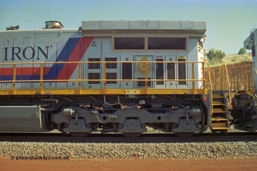 219-10
Yandicoogina or HIY as Hamersley Iron identify it, located 445 km from Parker Point yard in Dampier. Bank engine unit General Electric Dash 9-44CW model 7089 serial 47768 left hand side radiator and bogie view.
Keywords: 7089;GE;Dash-9-44CW;47768;