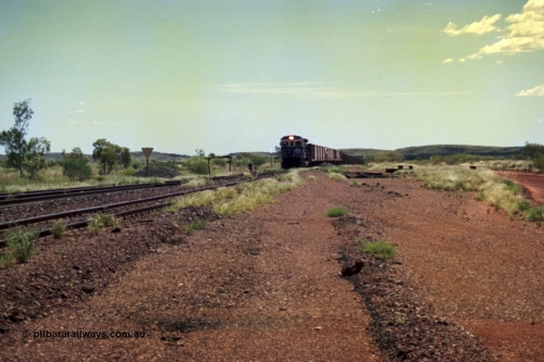 219-23
Goldsworthy Siding, C36-7M unit 5507 'Nimingarra' serial 4839-03 / 87-072, an original Mt Newman Mining ALCo C636 5461 to GE C36-7M rebuild carried out by Goninan, leads an empty train into the siding at Goldsworthy as the second driver sets the road.
Keywords: 5507;Goninan;GE;C36-7M;4839-03/87-072;rebuild;AE-Goodwin;ALCo;C636;5461;G6035-2;