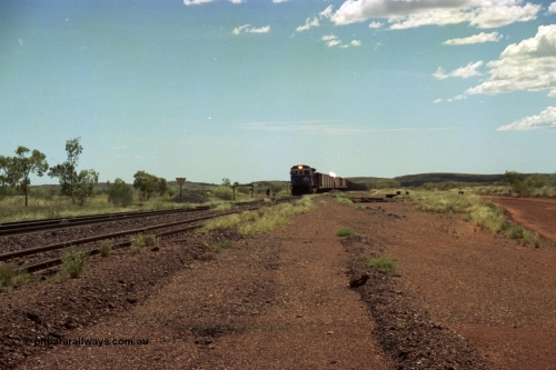 219-24
Goldsworthy Siding, C36-7M unit 5507 'Nimingarra' serial 4839-03 / 87-072, an original Mt Newman Mining ALCo C636 5461 to GE C36-7M rebuild carried out by Goninan, leads an empty train into the siding at Goldsworthy as the second driver sets the road.
Keywords: 5507;Goninan;GE;C36-7M;4839-03/87-072;rebuild;AE-Goodwin;ALCo;C636;5461;G6035-2;