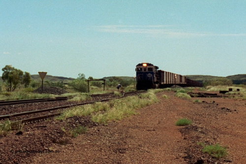 219-25
Goldsworthy Siding, C36-7M unit 5507 'Nimingarra' serial 4839-03 / 87-072, an original Mt Newman Mining ALCo C636 5461 to GE C36-7M rebuild carried out by Goninan, leads an empty train into the siding at Goldsworthy as the second driver sets the road.
Keywords: 5507;Goninan;GE;C36-7M;4839-03/87-072;rebuild;AE-Goodwin;ALCo;C636;5461;G6035-2;