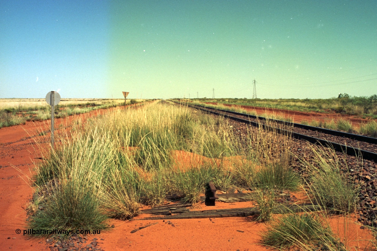 220-04
Taplin Siding, located between the 135 and 137.5 km on the former Goldsworthy Mining Ltd line, now part of the BHP Iron Ore network looking west from the eastern end of the siding.
