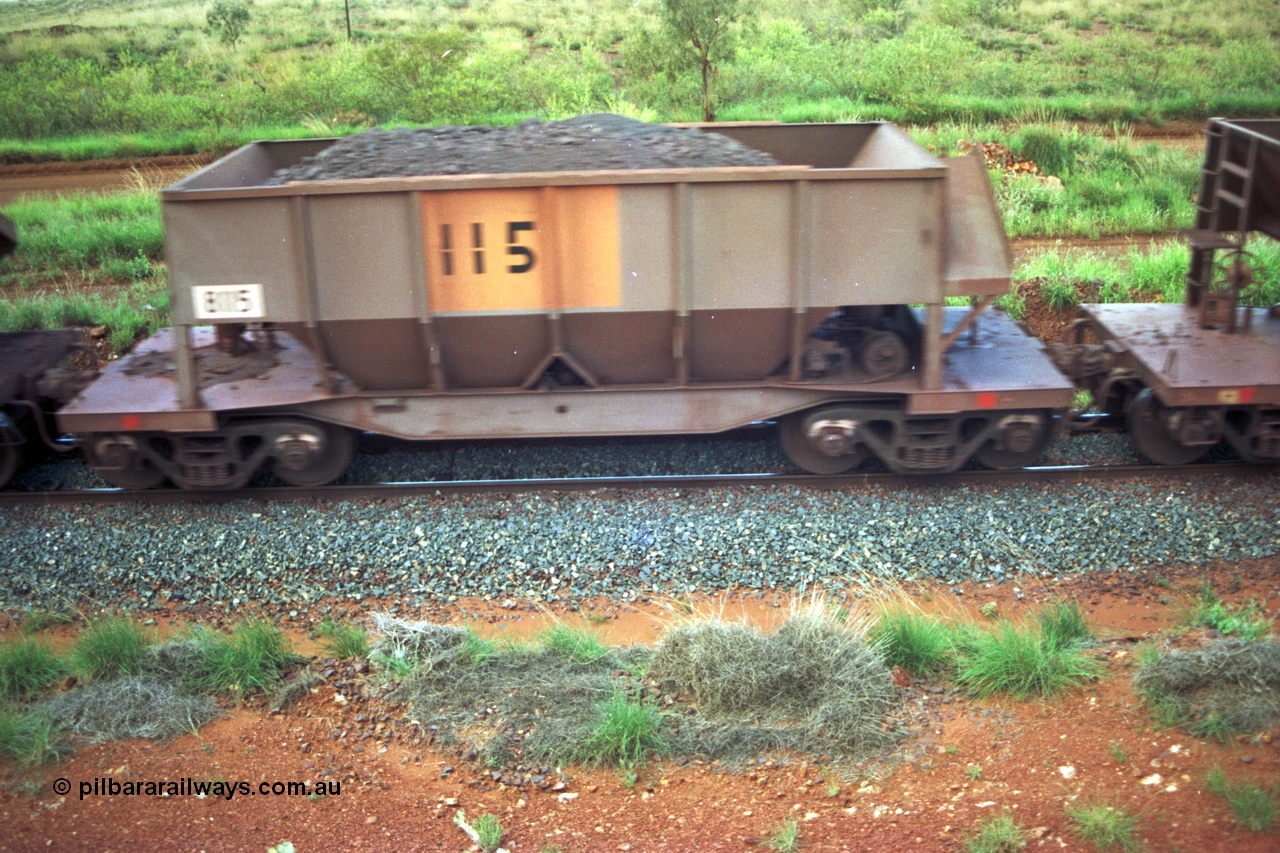 220-19
Tomlinson Steel WA built bottom discharge ore waggon 8115 loaded in the consist of a Yarrie train.
Keywords: 8115;Tomlinson-Steel-WA;BHP-ore-waggon;