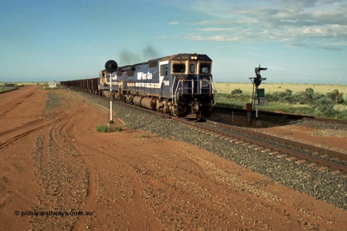 220-31
Goldsworthy Junction, the afternoon empty departure for Yandi mine behind the standard double Dash 8 power consist of 5649 'Pohang' a Goninan GE rebuild CM40-8M model serial 8412-07 / 93-140 and a sister unit as the split the sticks, the line merging from the right is the former Goldsworthy line from Yarrie and Nimingarra mines. This area is now fully duplicated with LED signals and the Dash 8 units have been scrapped.
Keywords: 5649;Goninan;GE;CM40-8M;8412-07/93-140;rebuild;AE-Goodwin;ALCo;M636C;5473;G6047-5;