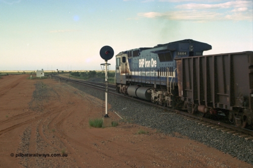 220-35
Goldsworthy Junction, empty train with the trailing loco a Goninan GE rebuild CM40-8ML model 5664 'Kaohsiung' serial 8412-09 / 94-155 was originally rebuilt without a driving cab for use as a LocoTrol II controlling remote, then one was retrofitted following improvements in the size of the required LocoTrol equipment and for operational purposes. Seen here as the trailing remote during a period of trials on Yandi trains where the consist was two leads units, 112 waggons, one loco, 112 waggons and the final loco.
Keywords: 5664;Goninan;GE;CM40-8ML;8412-09/94-155;rebuild;AE-Goodwin;ALCo;M636C;5469;G6047-1;