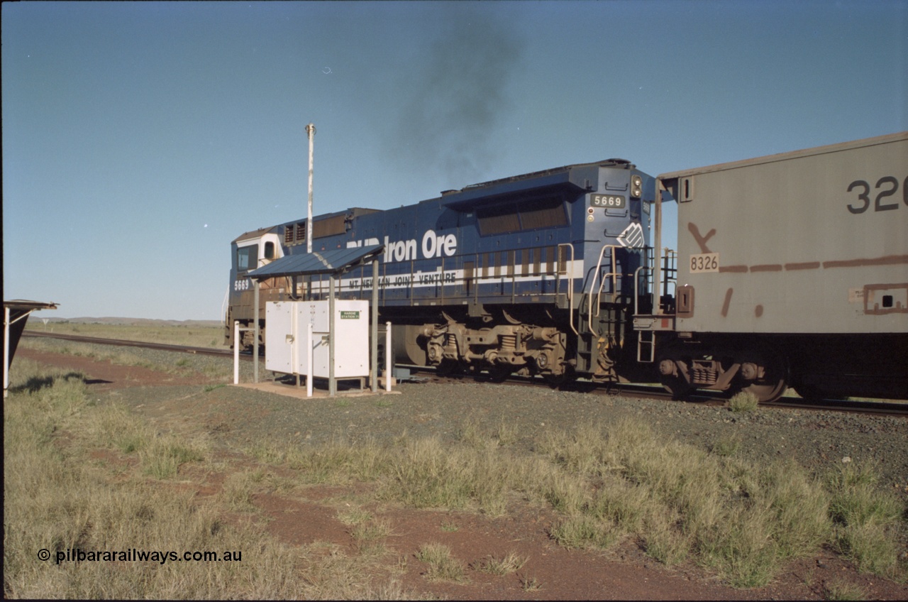 221-17
Hardie Siding, BHP Iron Ore Goninan rebuild unit CM40-8MEFI 5669 the last Dash 8 rebuilt for BHP and one of four fitted with an EFI prime mover, serial 95-160/8412-02, passes the Hardie Station 71 location cases and continues on the mainline bound for loading at Yarrie.
Keywords: 5669;Goninan;GE;CM40-8EFI;8412-02/95-160;rebuild;Comeng-NSW;ALCo;M636C;5486;C6084-2;
