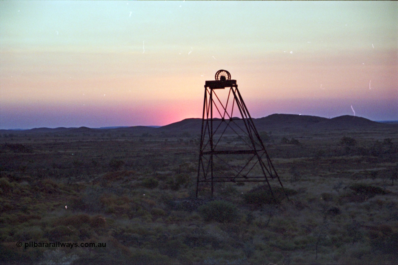 222-15
Lalla Rookh gold mine head frame at sunset. In the 1924 WA Mines Department report, it states there was a ten head battery and five cyanide vats for leaching located here [url=https://goo.gl/maps/9rohpzbjgdF2]GeoData[/url].
