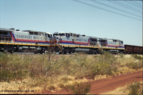 222-25
Somewhere on the original single line section between Gull and Rosella Hamersley Iron 7073 serial 47752 a General Electric Dash 9-44CW built by GE at Erie with 7091 has stopped for a crew change besides a loaded headed up by 7071.
Keywords: 7073;GE;Dash-9-44CW;47752;