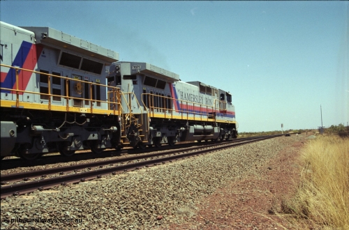 222-33
Somewhere on the original single line section between Gull and Rosella Hamersley Iron 7071 serial 47750 a General Electric Dash 9-44CW built by GE at Erie brings a loaded train away from the passing track back onto the mainline following a crew change with second unit 7066.
Keywords: 7071;GE;Dash-9-44CW;47750;