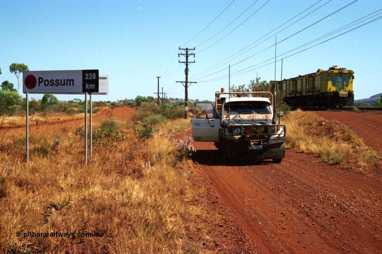 223-11
Possum Siding sign on the Hamersley Iron Dampier to Paraburdoo line, located 228 km from Dampier. 21st October 2000.
