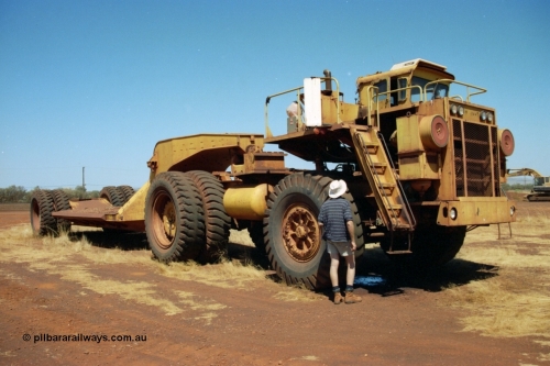 223-05
Rosella Siding, old Hamersley Iron machine transporter, prime mover is a KW Dart, possibly a model DE 2551. 21st October 2000.
Keywords: KW-Dart;DE2551;