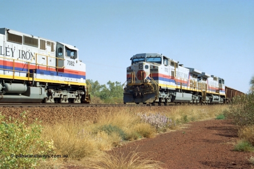 223-24
Possum Siding, Hamersley Iron locos built by General Electric model Dash 9-44CW units 7072 serial 47751 with 210 waggons loaded ex Marandoo changes crew with sister loco 7082 serial 47761 on an empty at 1500 hrs 21st October 2000.
Keywords: 7072;GE;Dash-9-44CW;47751;