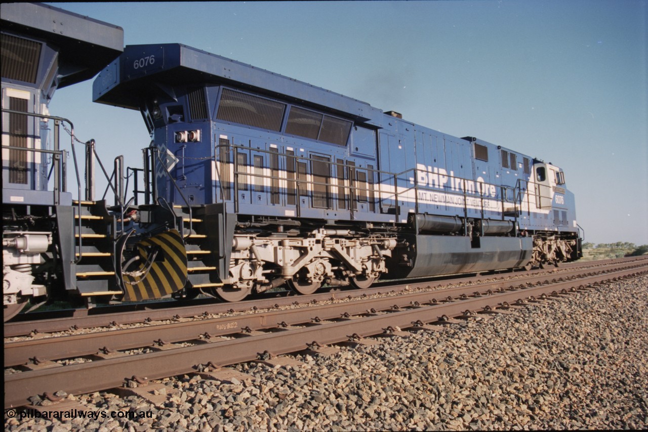 224-06
Bing siding, 6076 'Mt Goldsworthy' serial 51068 a General Electric AC6000 built by GE at Erie awaits the road to depart south. [url=https://goo.gl/maps/KQrczNpVhAH2]GeoData[/url].
Keywords: 6076;51068;GE;AC6000;