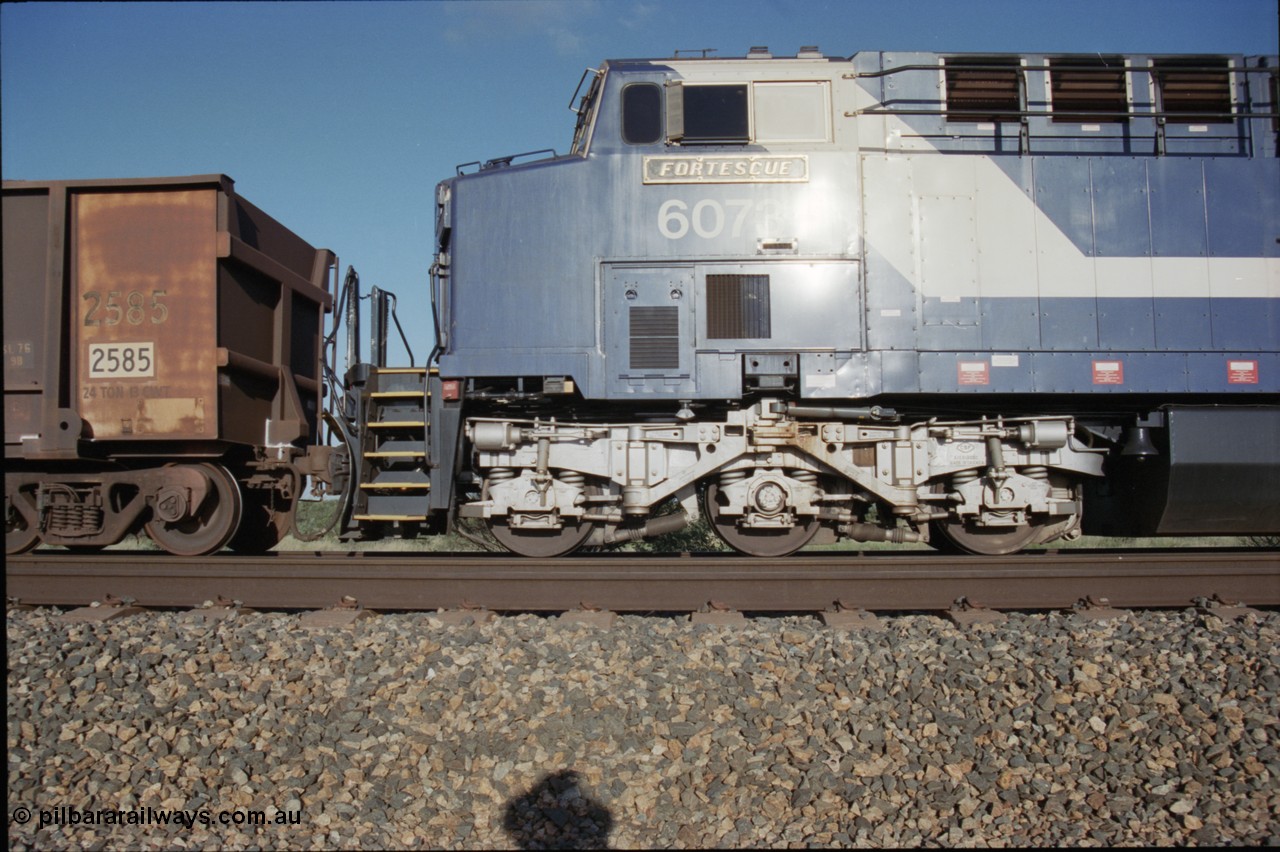 224-09
Bing siding, 6073 'Fortescue' serial 51065 a General Electric AC6000 built by GE at Erie awaits the road to depart south, cab side shows new nameplate, steerable bogie and taper in cab side. [url=https://goo.gl/maps/KQrczNpVhAH2]GeoData[/url].
Keywords: 6073;51065;GE;AC6000;