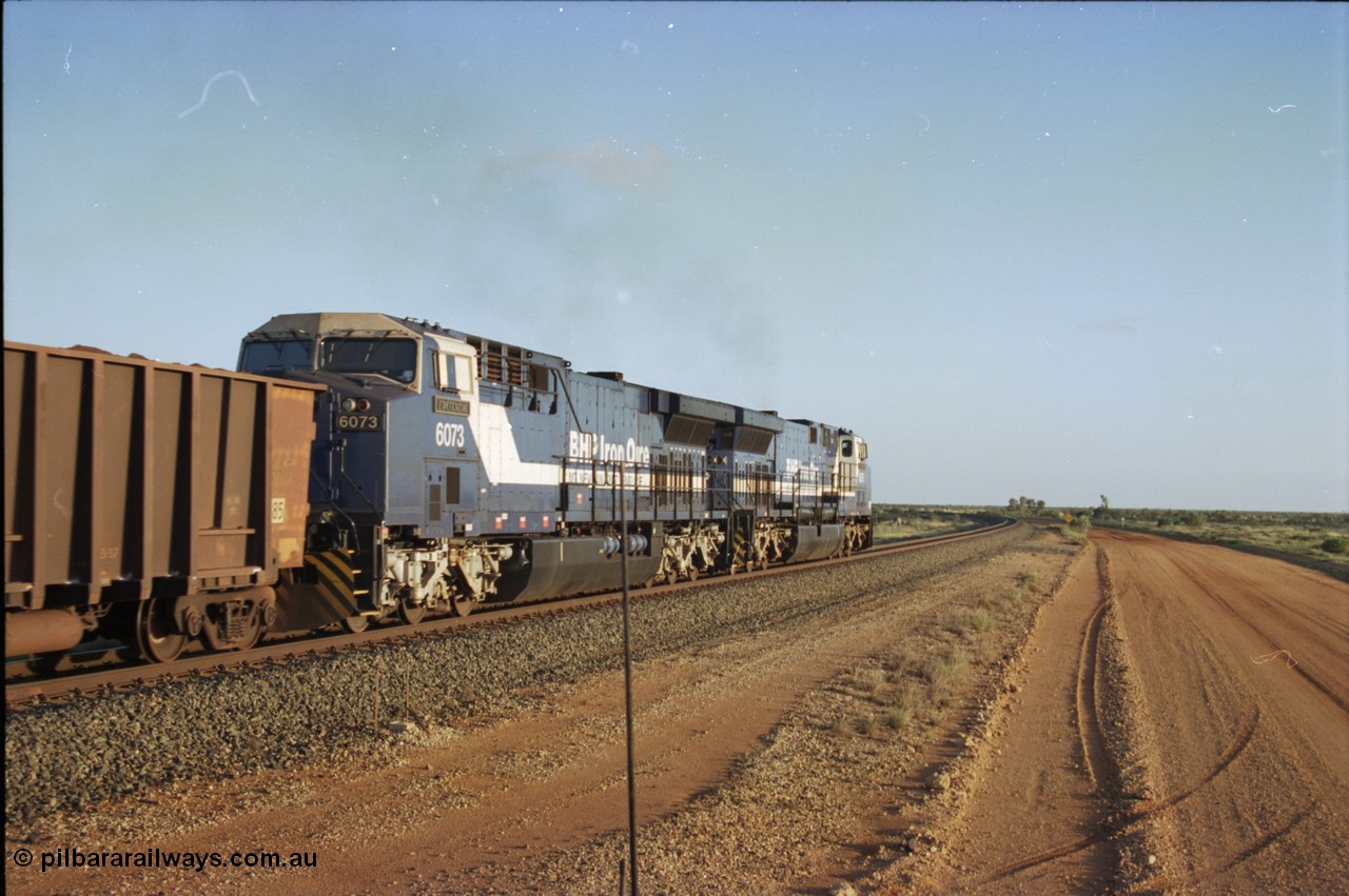224-35
Bing siding, 6073 'Fortescue' serial 51065 a General Electric AC6000 built by GE at Erie departs south. [url=https://goo.gl/maps/KQrczNpVhAH2]GeoData[/url].
Keywords: 6073;GE;AC6000;51065;