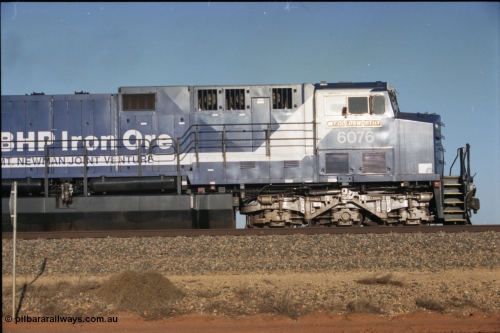 224-19
Bing siding, 6076 'Mt Goldsworthy' serial 51068 a General Electric AC6000 built by GE at Erie awaits the road to depart south, cab side shows new nameplate, steerable bogie and taper in cab side. [url=https://goo.gl/maps/KQrczNpVhAH2]GeoData[/url].
Keywords: 6076;GE;AC6000CW;51068;