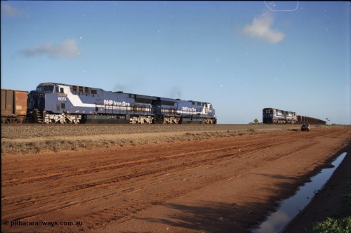224-23
Bing siding, the afternoon empty to Yandi was a staple of the AC6000 units when delivered, operating the train as a pair, 112 waggons, AC6000 and 112 waggons. 6076 'Mt Goldsworthy' serial 51068 a General Electric AC6000 built by GE at Erie awaits the road to depart south with sister unit 6073 as a loaded behind two CM40-8M units rolls through on the mainline. [url=https://goo.gl/maps/KQrczNpVhAH2]GeoData[/url].
Keywords: 6073;GE;AC6000CW;51065;