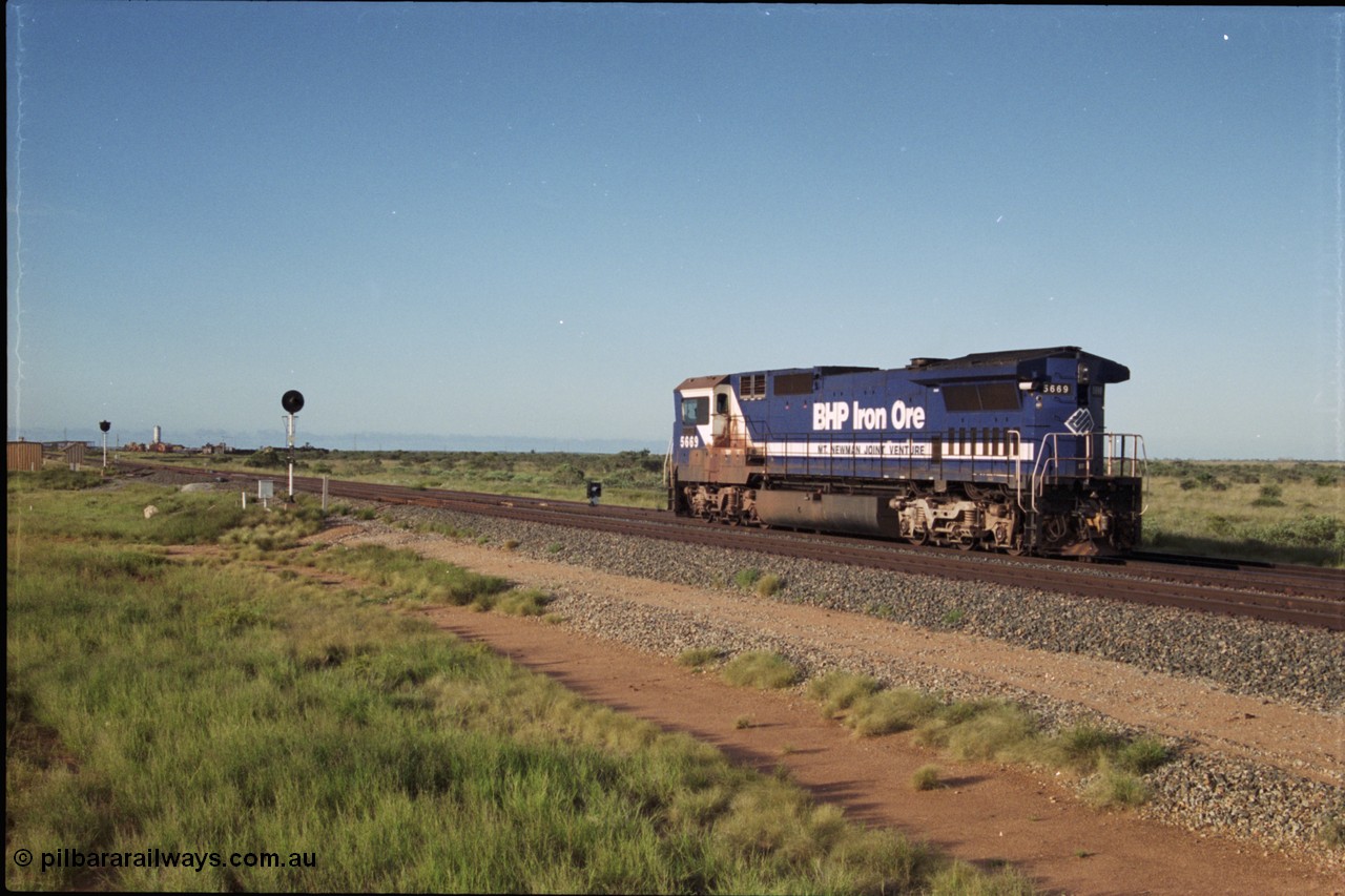 225-02
Bing siding at the 17.5 km, Goninan rebuild CM40-8MEFI GE loco 5669 'Beilun' serial 8412-02 / 95-160 was the last Dash 8 built for BHP Iron Ore, seen here sitting at BNN 6 signal awaiting a path, note the CCTV camera mounted under the radiator wing as a trial for single man crewing when long end leading. [url=https://goo.gl/maps/wYjgpDcnvqs]GeoData[/url].
Keywords: 5669;Goninan;GE;CM40-8EFI;8412-02/95-160;rebuild;Comeng-NSW;ALCo;M636C;5486;C6084-2;