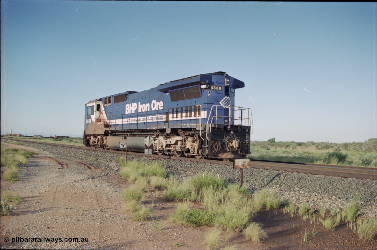 225-14
Bing siding at the 17 km, Goninan rebuild CM40-8MEFI GE loco 5669 'Beilun' serial 8412-02 / 95-160 was the last Dash 8 built for BHP Iron Ore, heading into Nelson Point, note the CCTV camera mounted under the radiator wing as a trial for single man crewing when long end leading. [url=https://goo.gl/maps/wYjgpDcnvqs]GeoData[/url].
Keywords: 5669;Goninan;GE;CM40-8EFI;8412-02/95-160;rebuild;Comeng-NSW;ALCo;M636C;5486;C6084-2;