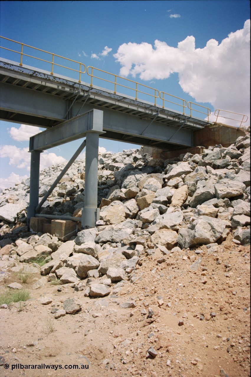 226-01
Yule River bridge showing new piles and deck to replace flood damaged piles after a cyclone that closed the line for two weeks in the late 1990s. [url=https://goo.gl/maps/G67Mat23u4P2]GeoData[/url].
