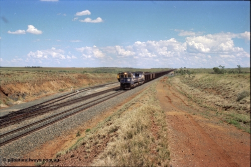 226-25
Shaw siding at the 219 km a loaded train with power from two Goninan CM40-8M GE rebuild units 5642 'Wallareenya' serial 8281-07 / 92-131 and sister unit 5636, the mid-train remotes can be seen in the distance topping the grade. [url=https://goo.gl/maps/JLjSYskHScU2]GeoData[/url].
Keywords: 5642;Goninan;GE;CM40-8M;8281-07/92-131;rebuild;AE-Goodwin;ALCo;C636;5467;G6041-3;