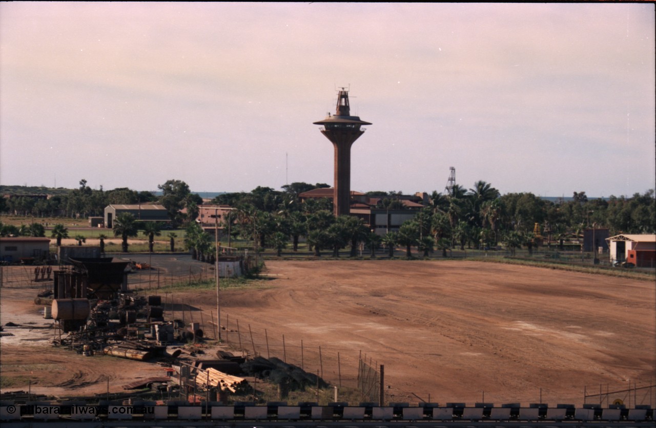 227-11
Port Hedland harbour control tower, the salt conveyor is at the bottom of the picture, the high building beyond the tower is the Esplanade Hotel, with the two story building to the right of the tower the Port Authority offices. [url=https://goo.gl/maps/1sLxDMF5tZu]GeoData[/url].
