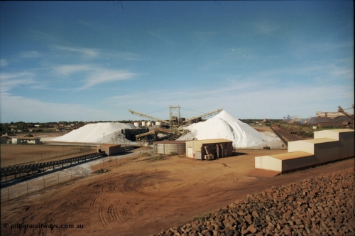 227-09
Nelson Point, a view from the rear of A berth at the salt pile and stacker, this was operated by Cargill at the time of the photo. The under harbour tunnel portal is on the right. [url=https://goo.gl/maps/1sLxDMF5tZu]GeoData[/url].
