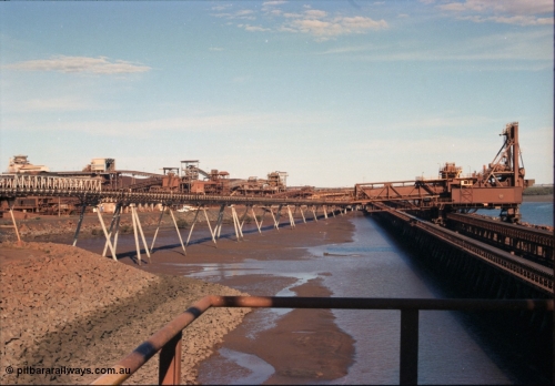 227-17
Nelson Point, from the rear of Shiploader 2 looking south with Shiploader 1 on the right on B berth, and the ore transporting infrastructure. [url=https://goo.gl/maps/1sLxDMF5tZu]GeoData[/url].
