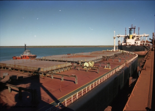 227-36
Nelson Point, tug boat Warilla, 50 ton bollard pull Z-Peller type, built by Tamar Steel Boats in Launceston in 1982, pulls a loaded carrier clear of B berth.
