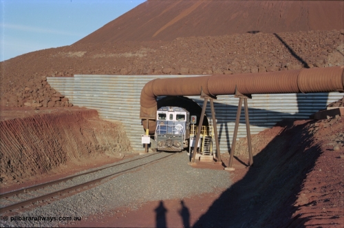 228-33
Yandi Two load-out tunnel, Goninan rebuilt GE CM40-8M model 5649 'Pohang' serial 8412-07/93-140 eases a loading train out of the tunnel at the required 1.2 km/h. 5649 started life back in 1971 as an AE Goodwin built ALCo M636 5473 serial G6047-5. Geodata [url=https://goo.gl/maps/BNPMxDyxxXC2] -22.719050, 119.040566 [/url].
Keywords: 5649;Goninan;GE;CM40-8M;8412-07/93-140;rebuild;AE-Goodwin;ALCo;M636C;5473;G6047-5;