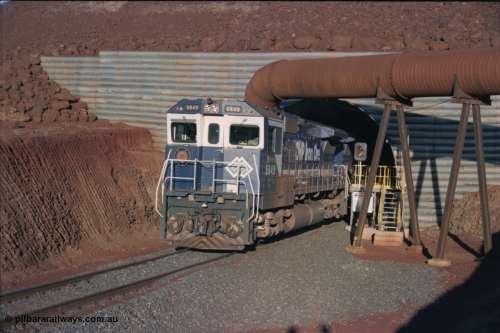 228-35
Yandi Two load-out tunnel, Goninan rebuilt GE CM40-8M model 5649 'Pohang' serial 8412-07/93-140 eases a loading train out of the tunnel at the required 1.2 km/h. 5649 started life back in 1971 as an AE Goodwin built ALCo M636 5473 serial G6047-5. Geodata [url=https://goo.gl/maps/BNPMxDyxxXC2] -22.719050, 119.040566 [/url].
Keywords: 5649;Goninan;GE;CM40-8M;8412-07/93-140;rebuild;AE-Goodwin;ALCo;M636C;5473;G6047-5;